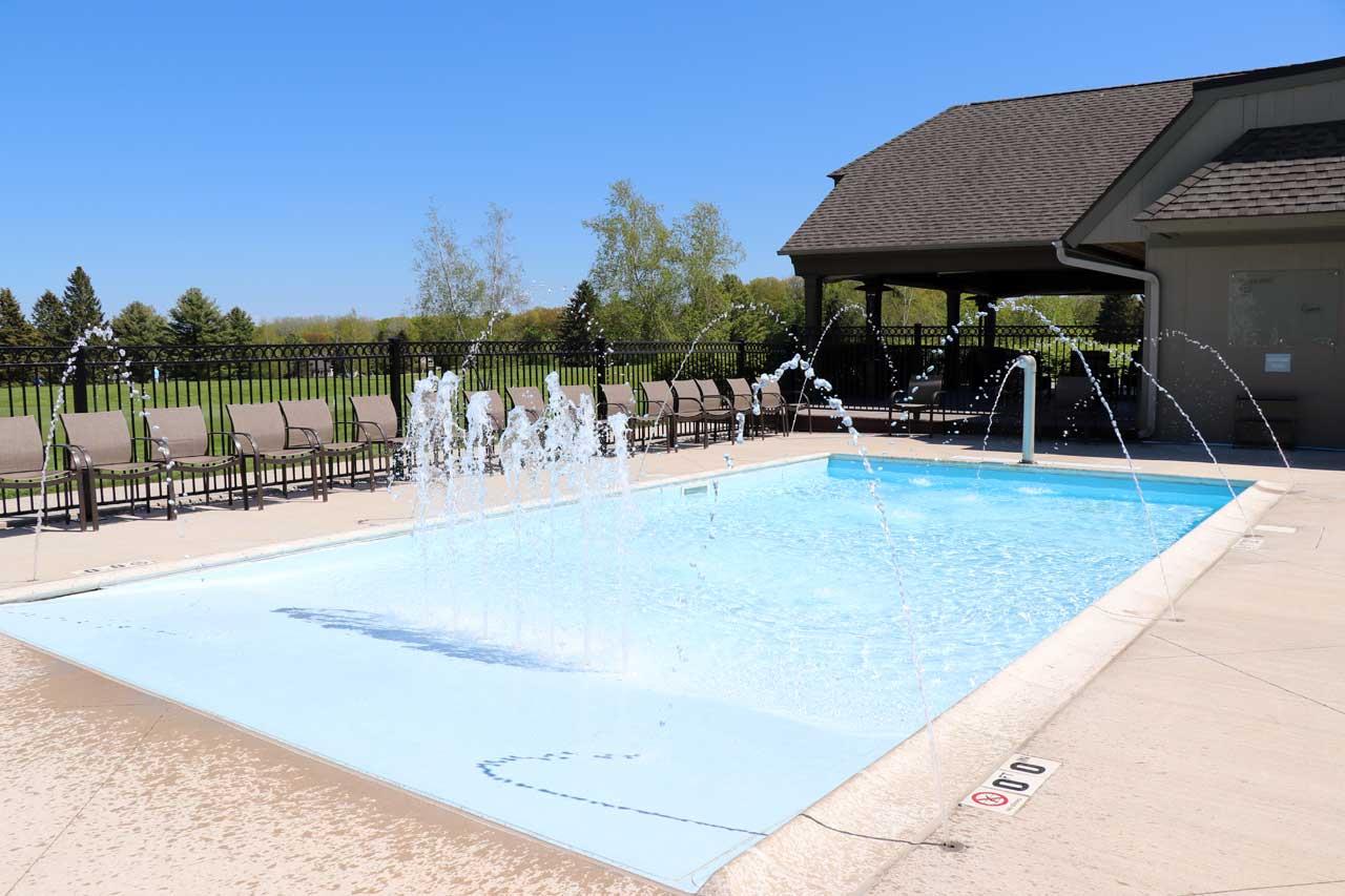 Outdoor heated pools with furniture